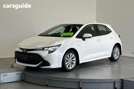 White 2024 Toyota Corolla Hatchback Ascent Sport + Conv Pk Hybrid