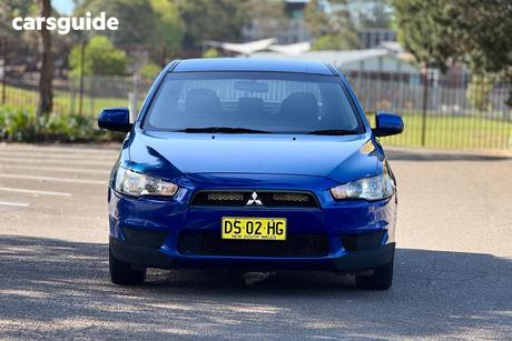 Blue 2010 Mitsubishi Lancer Sedan Sx
