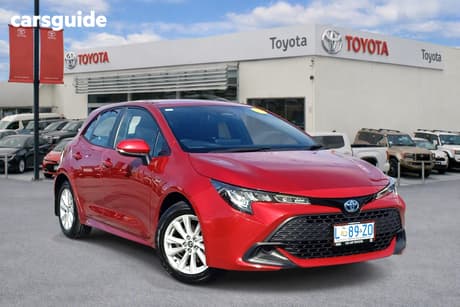 Red 2024 Toyota Corolla Hatchback Ascent Sport Hybrid