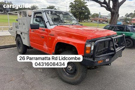 Orange 1992 Ford Maverick Cab Chassis (4X4)