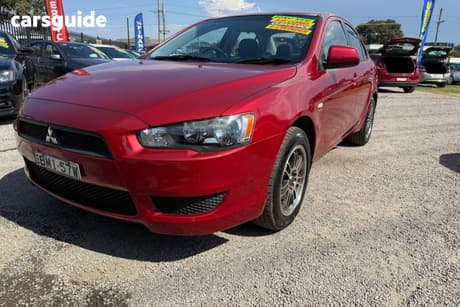Red 2009 Mitsubishi Lancer Sedan Es