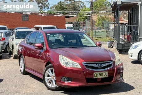 Red 2010 Subaru Liberty Sedan
