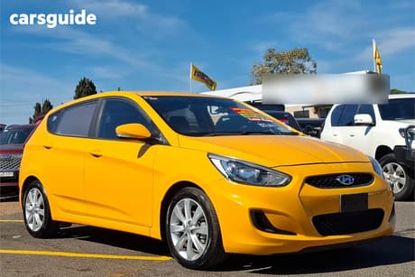 Yellow 2017 Hyundai Accent Hatchback Sport