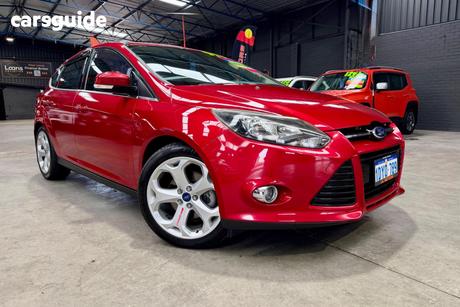 Red 2012 Ford Focus Hatchback Sport