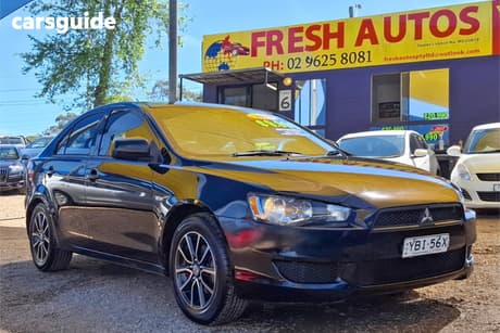 Black 2013 Mitsubishi Lancer Sedan Es