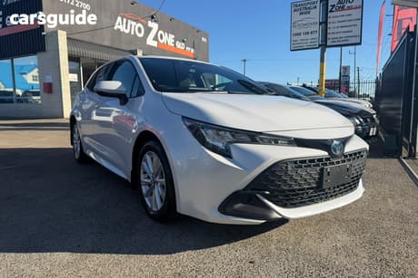White 2023 Toyota Corolla Hatchback Ascent Sport + Conv Pk Hybrid