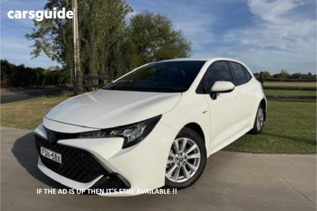 White 2024 Toyota Corolla Hatchback Ascent Sport Hybrid
