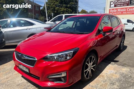 Red 2016 Subaru Impreza Hatchback 2.0L (Awd)