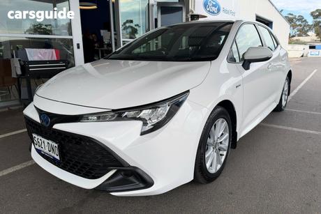 White 2024 Toyota Corolla Hatchback Ascent Sport + Conv Pk Hybrid