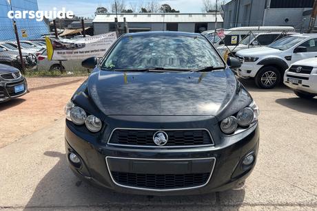 Black 2013 Holden Barina Sedan Cdx