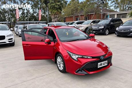 Red 2023 Toyota Corolla Hatchback Ascent Sport
