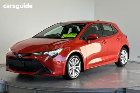 Orange 2024 Toyota Corolla Hatchback Ascent Sport + Conv Pk Hybrid