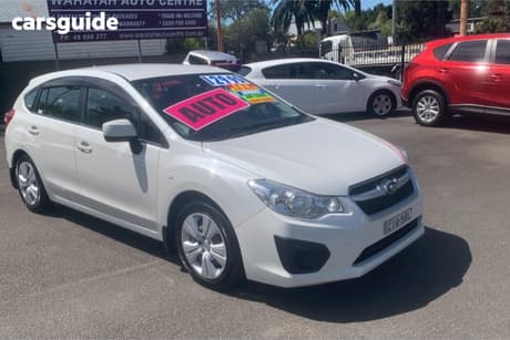 White 2012 Subaru Impreza Hatchback 2.0I (Awd)