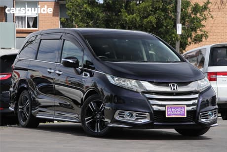 Black 2017 Honda Odyssey SUV ABSOLUTE-SENSING (HYBRID)