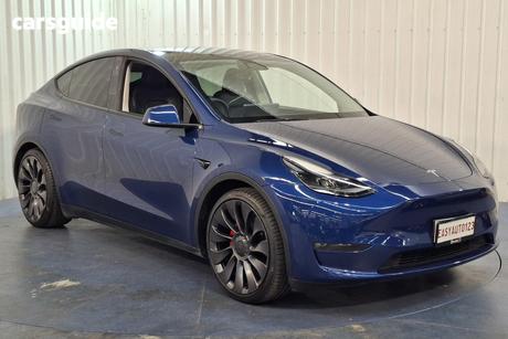 Blue 2023 Tesla Model Y Wagon Performance
