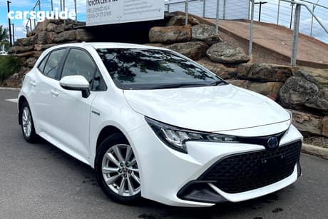 White 2023 Toyota Corolla Hatchback Ascent Sport Hybrid