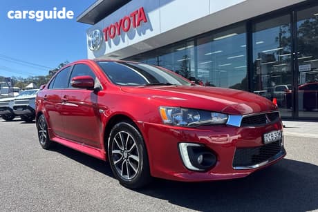 Red 2015 Mitsubishi Lancer Sedan Es Sport