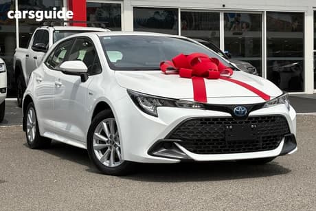White 2025 Toyota Corolla Hatchback Ascent Sport Hybrid