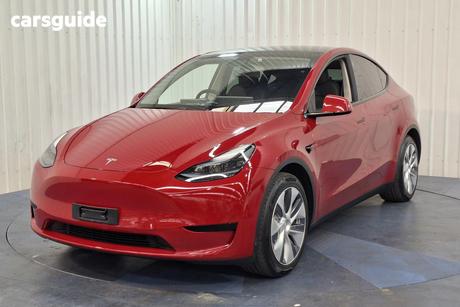 Red 2022 Tesla Model Y Wagon Rear-Wheel Drive
