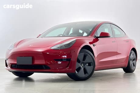Red 2021 Tesla Model 3 Sedan Standard Range Plus Rwd