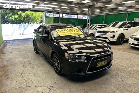 Black 2015 Mitsubishi Lancer Sedan Es Sport