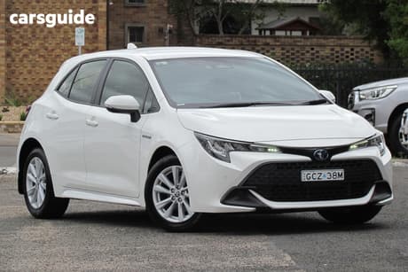 White 2023 Toyota Corolla Hatchback Ascent Sport Hybrid