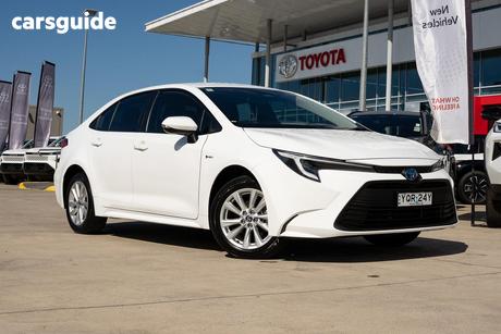 White 2024 Toyota Corolla Sedan Ascent Sport Hev