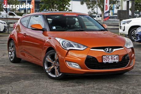 Orange 2011 Hyundai Veloster Hatch + F