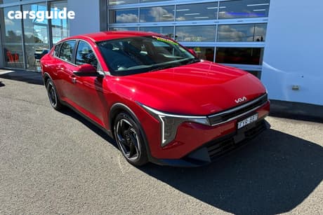 Red 2025 Kia K4 Sedan Sport