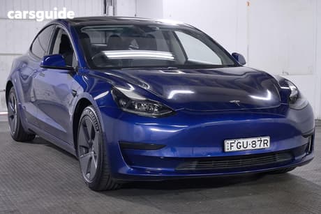 Blue 2021 Tesla Model 3 Sedan Standard Range Plus Rwd