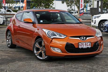Orange 2011 Hyundai Veloster Hatch + F
