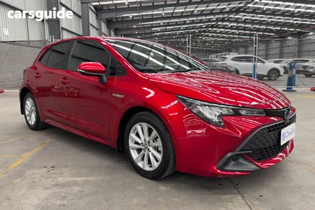 Red 2022 Toyota Corolla Hatchback Ascent Sport Hybrid