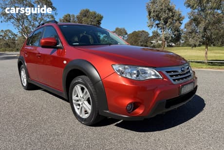 Orange 2010 Subaru Impreza Hatchback Xv (Awd)