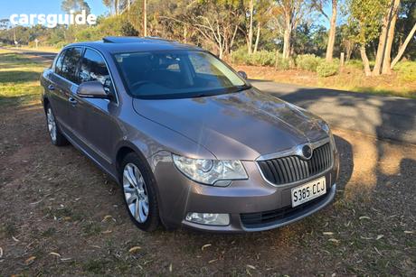 Brown 2012 Skoda Superb Sedan 125 Tdi Elegance