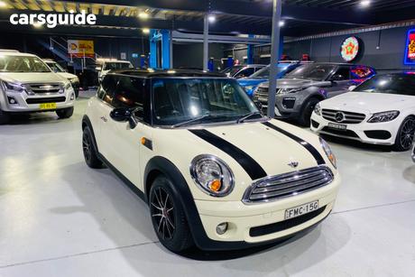 Cream 2009 Mini Cooper Hatchback