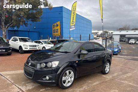 Black 2013 Holden Barina Sedan Cdx
