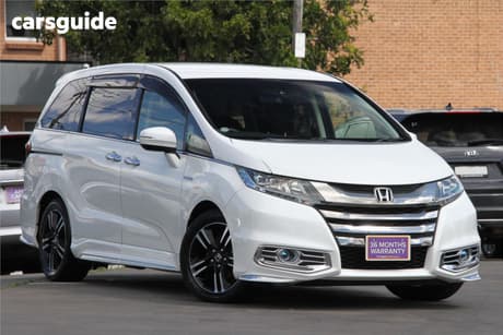 White 2016 Honda Odyssey SUV ABSOLUTE-SENSING EX PACKAGE (HYBRID)