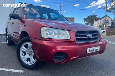 Red 2002 Subaru Forester Wagon X