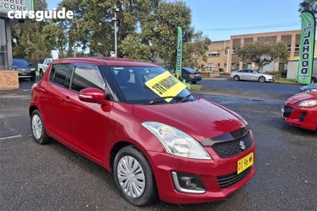 Red 2014 Suzuki Swift Hatchback Gl Navigator