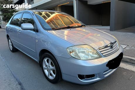 Silver 2004 Toyota Corolla Sedan Conquest