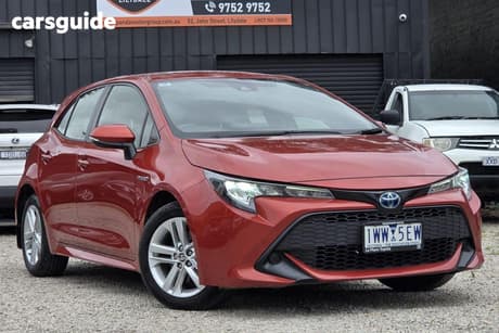 Red 2019 Toyota Corolla Hatchback Ascent Sport (Hybrid)