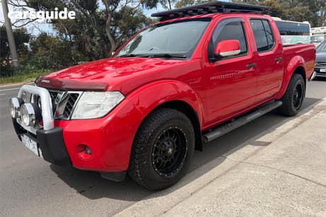 Red 2012 Nissan Navara Dual Cab Pick-up St (4X2)