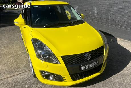Yellow 2013 Suzuki Swift Hatchback Sport