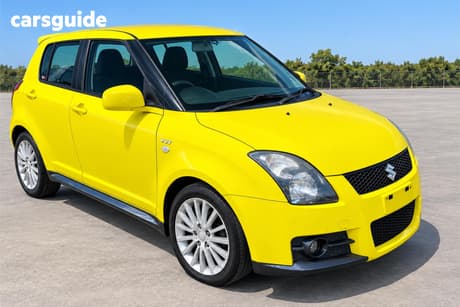 Yellow 2009 Suzuki Swift Hatchback Sport