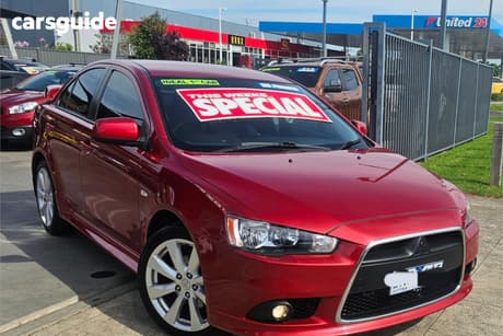 Red 2012 Mitsubishi Lancer Sedan Vr-X