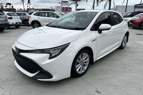 White 2023 Toyota Corolla Hatchback Ascent Sport Hybrid
