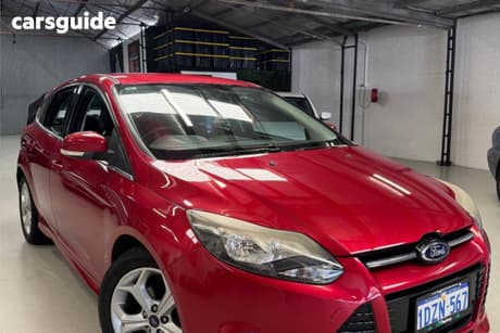 Red 2012 Ford Focus Hatchback Sport