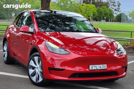 Red 2022 Tesla Model Y Wagon Rear-Wheel Drive