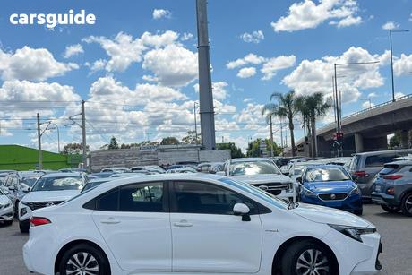 White 2021 Toyota Corolla Sedan Ascent Sport (Hybrid)