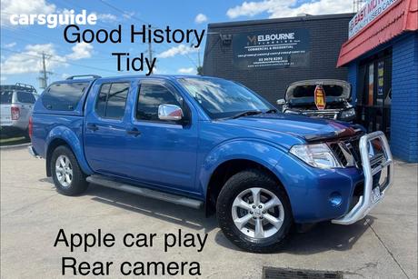 Blue 2010 Nissan Navara Dual Cab Pick-up St-X (4X4)